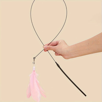 Interactive cat teaser wand toy with flexible steel wire, detachable feather teaser and suction cup base for indoor cats - durable plastic construction, no batteries needed.