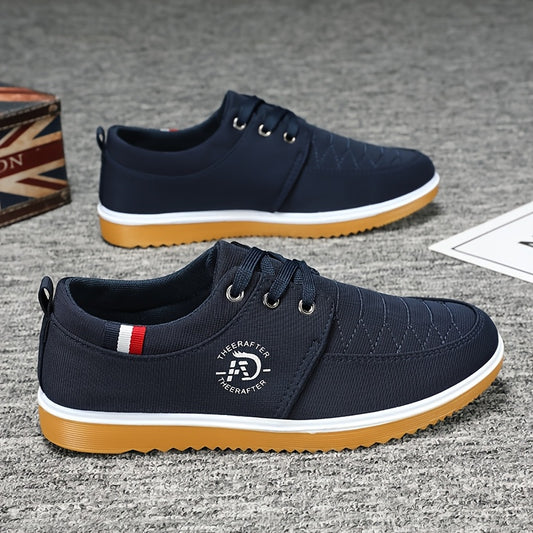 Men's breathable canvas sneakers with fabric lining, rubber sole, and lace-up closure.