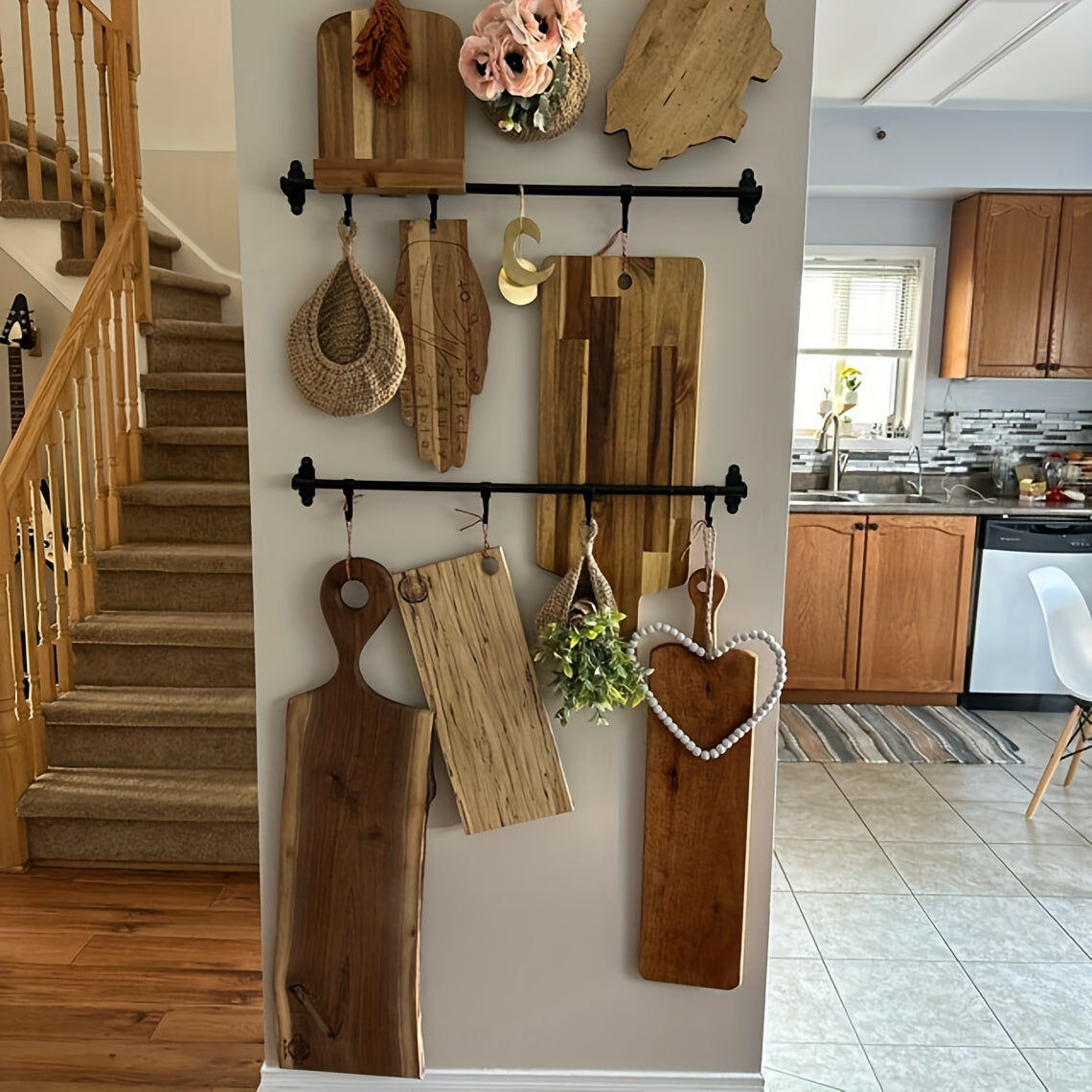 Set of 3 hanging baskets made of cotton rope and sisal crochet, featuring water drops design. This versatile storage solution can be used as a fruit, vegetable, or plant holder, or as a kitchen organizer. Hang them on the wall to save space and add a