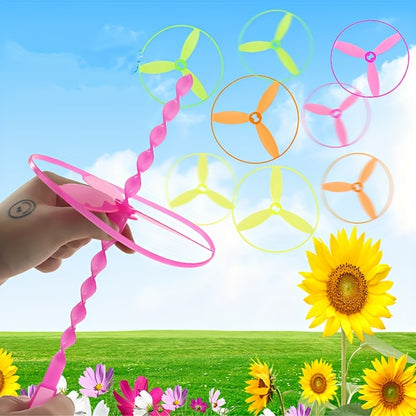 40 pieces pack of Flying Fairy hand push and rotate disc helicopter toy, perfect for outdoor camping and lawn games. Ideal for parties, festivals, and birthdays.