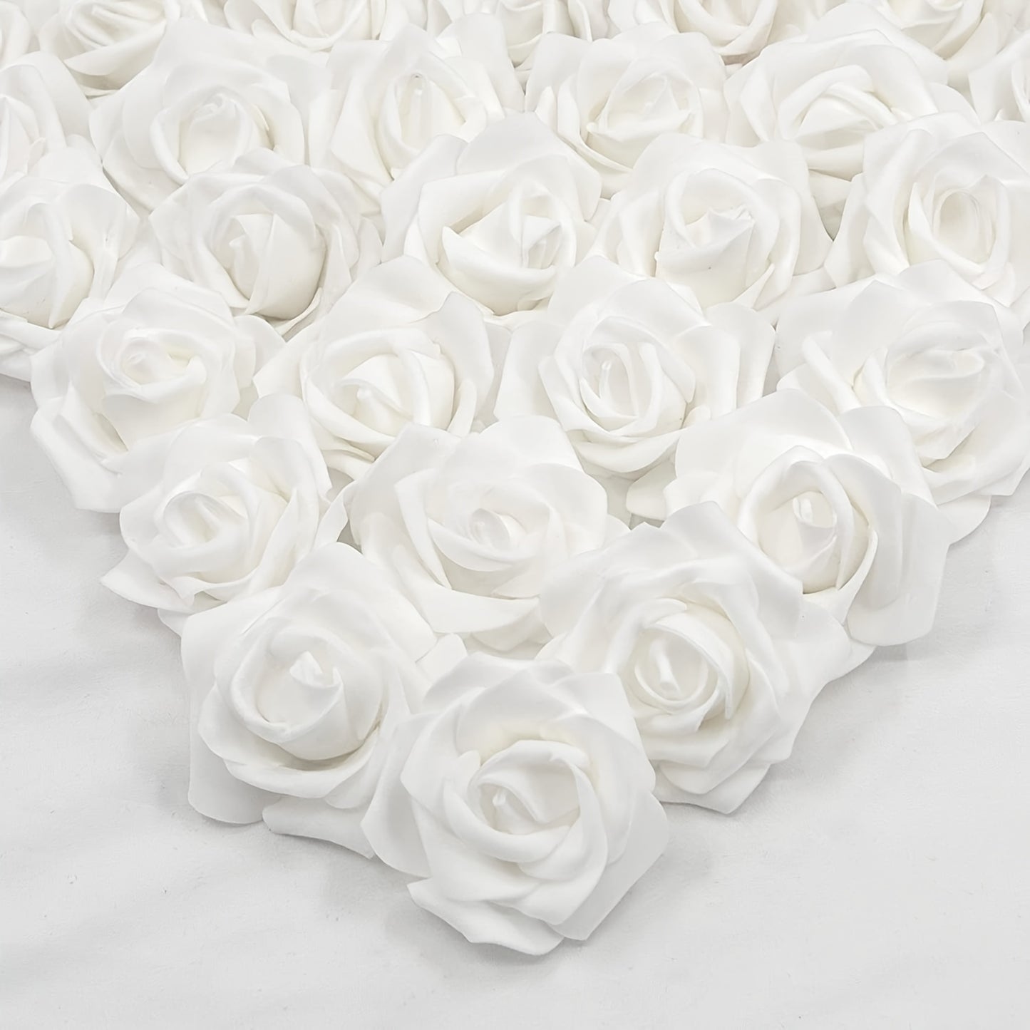 50 pack of luxurious PE foam artificial rose flower heads for various occasions - perfect for DIY crafts, weddings, and home décor throughout the year.