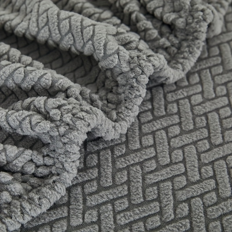 Gray fleece sofa cover suitable for all seasons, elastic and protective for home use.