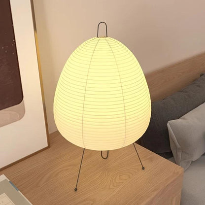 Stylish LED Japanese lantern table lamp with warm yellow light, ideal for various rooms and settings, USB powered with button control, perfect for bedroom decor.