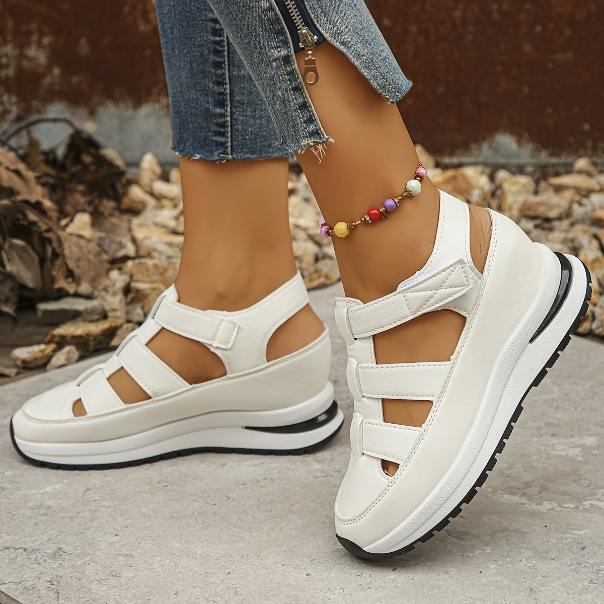 Stylish wedge sandals with hidden height, thick sole and hook-and-loop closure for comfort and versatility.