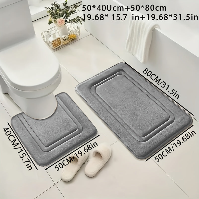 Two coral fleece bath mats, absorbent and non-slip, made from soft polyester knit fabric, 530gsm, 1.3cm thick, suitable for tub, shower, and bathroom decor.