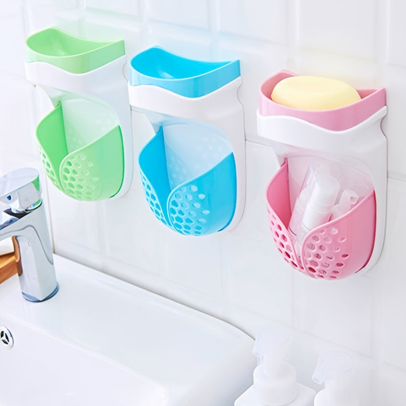 Wall-mounted soap dish with strong adhesive and double-layer design. No-drill drainage system for bathroom and kitchen storage. Features a creative suction cup and soap box.