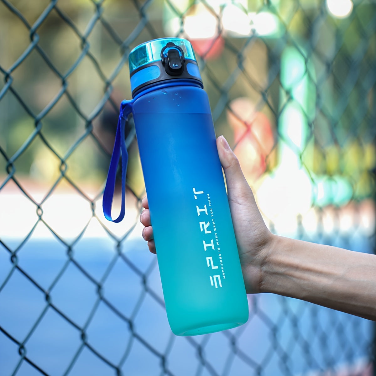 Portable Gradient Sports Water Bottle in 26oz or 10.5oz sizes, leakproof, dishwasher safe for outdoor use.