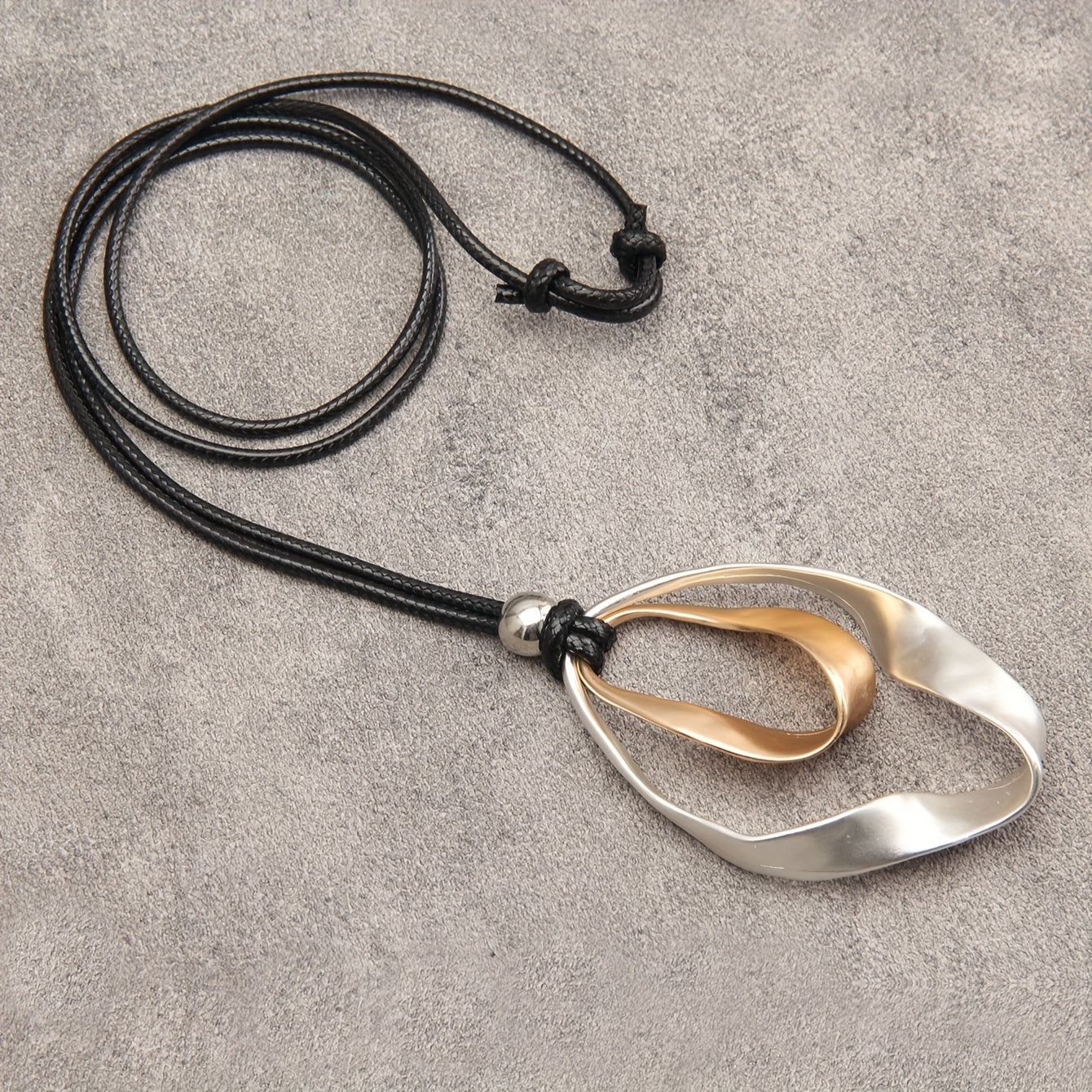 Stylish Twisted Teardrop Pendant Necklace for Women, made with Alloy featuring a Wide Edge Design. Includes a Simple Black Cord Long Chain, Perfect Romantic Gift for your Girlfriend. A Statement Jewelry Piece.