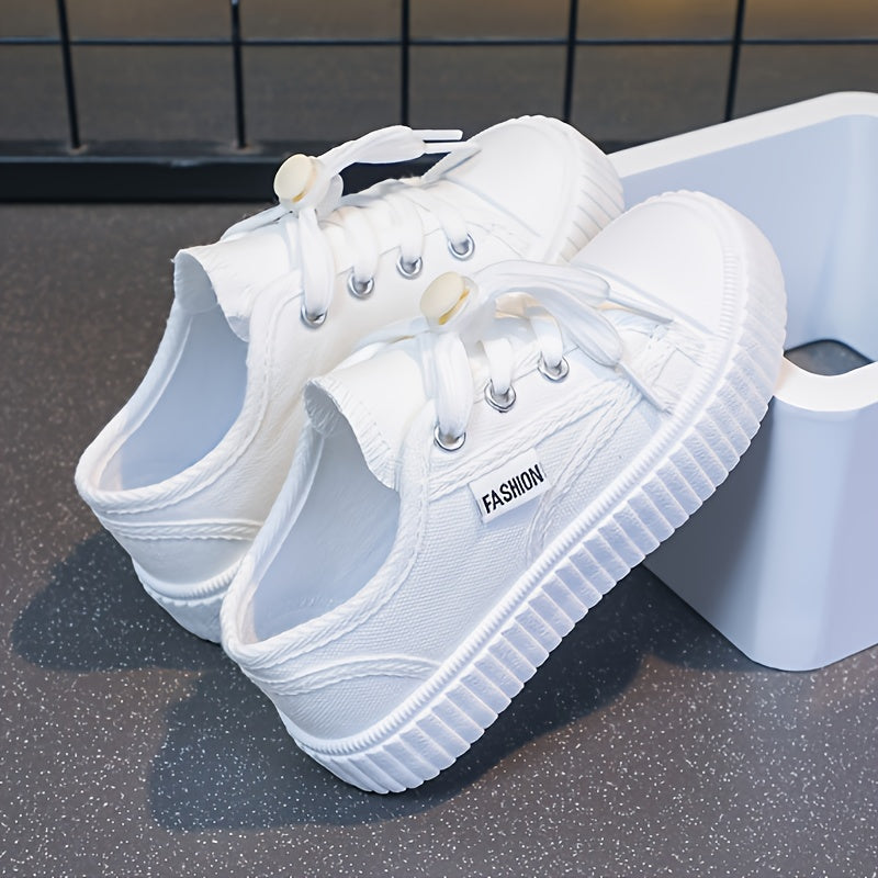 Casual, comfortable low top sneakers for girls made of lightweight, non-slip canvas for all seasons.