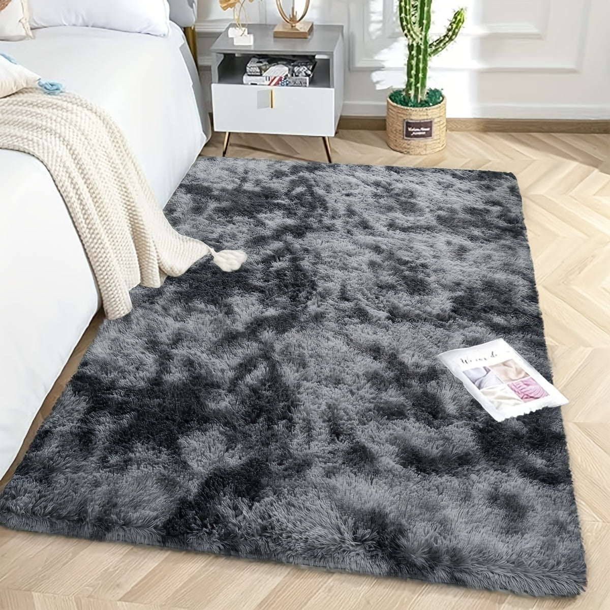 Soft, fluffy shag area rug perfect for living room or bedroom decor. This non-slip machine washable carpet adds luxury and coziness to any space.