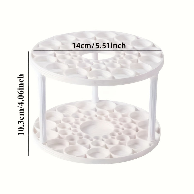 White plastic organizer with glaze finish, rotating brush holder for art brushes, pens, and makeup tools, multi-compartment desk accessory.