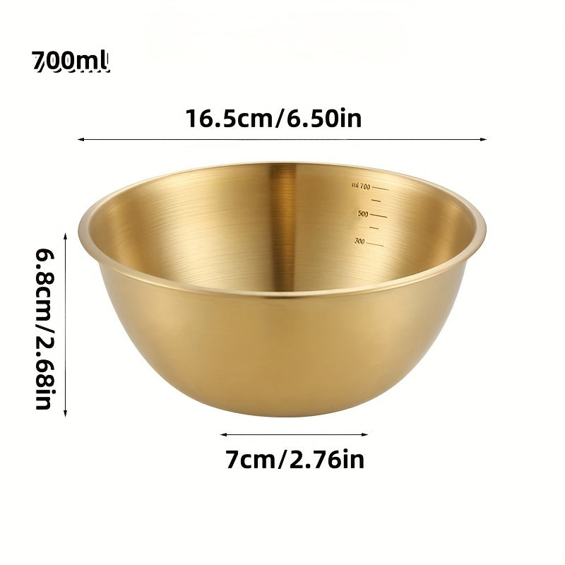 A durable stainless steel salad bowl with scale, oven safe and with brushed metal finish, suitable for home and school use.