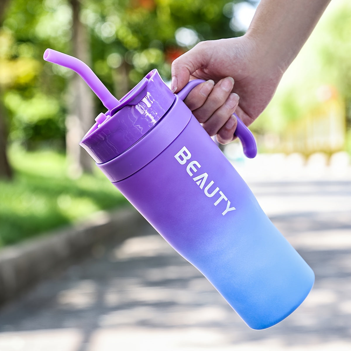 The BEAUTY Portable Water Bottle with Straw is large, lightweight, and suitable for hiking. It is made of plastic and has a round shape, and should be hand washed.