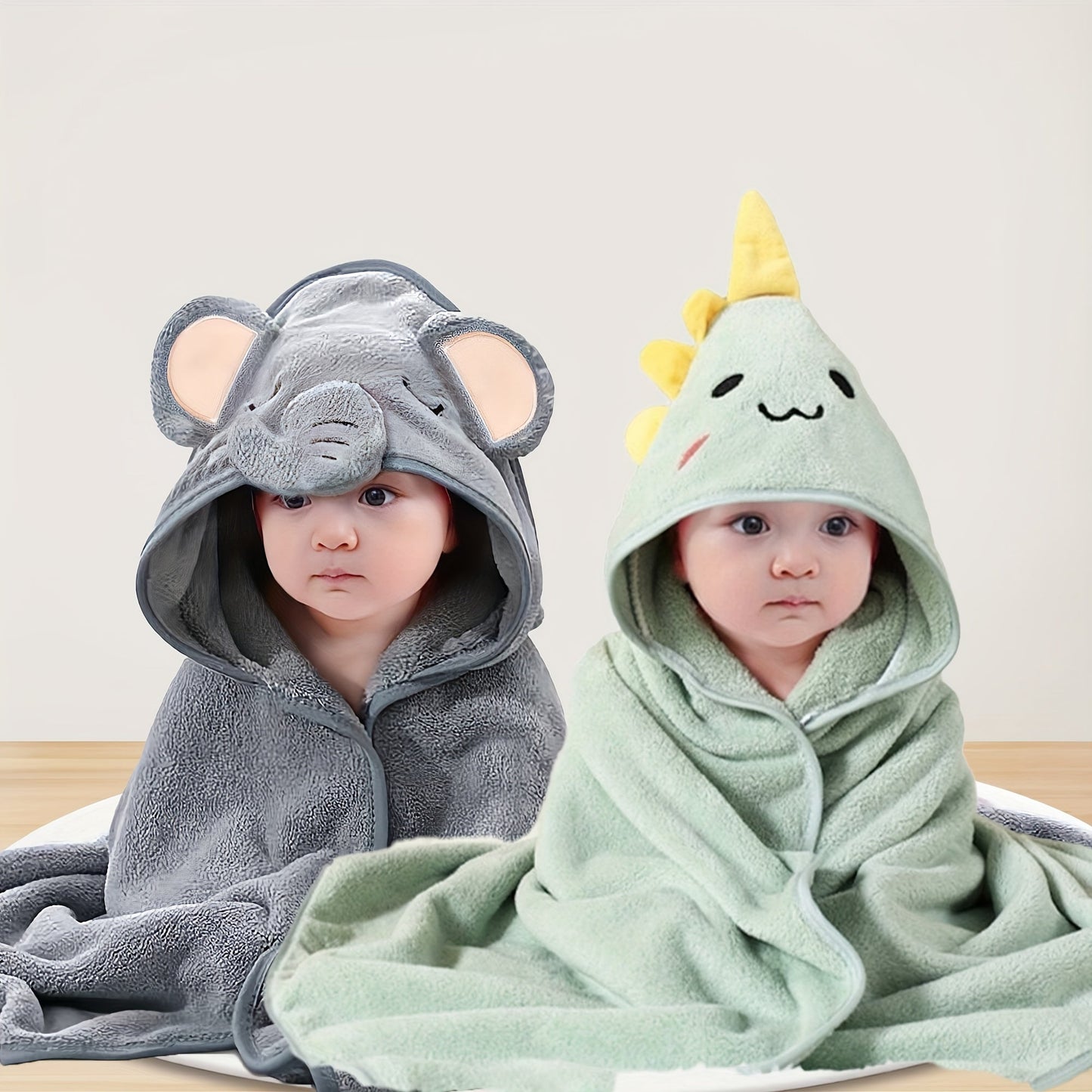 Two adorable cartoon hooded bath towels for children, featuring super soft and comfortable coverlets. These children's cartoon animal bathrobes are perfect for all seasons and make essential gifts for newborns on Christmas, Halloween, or Children's Day.