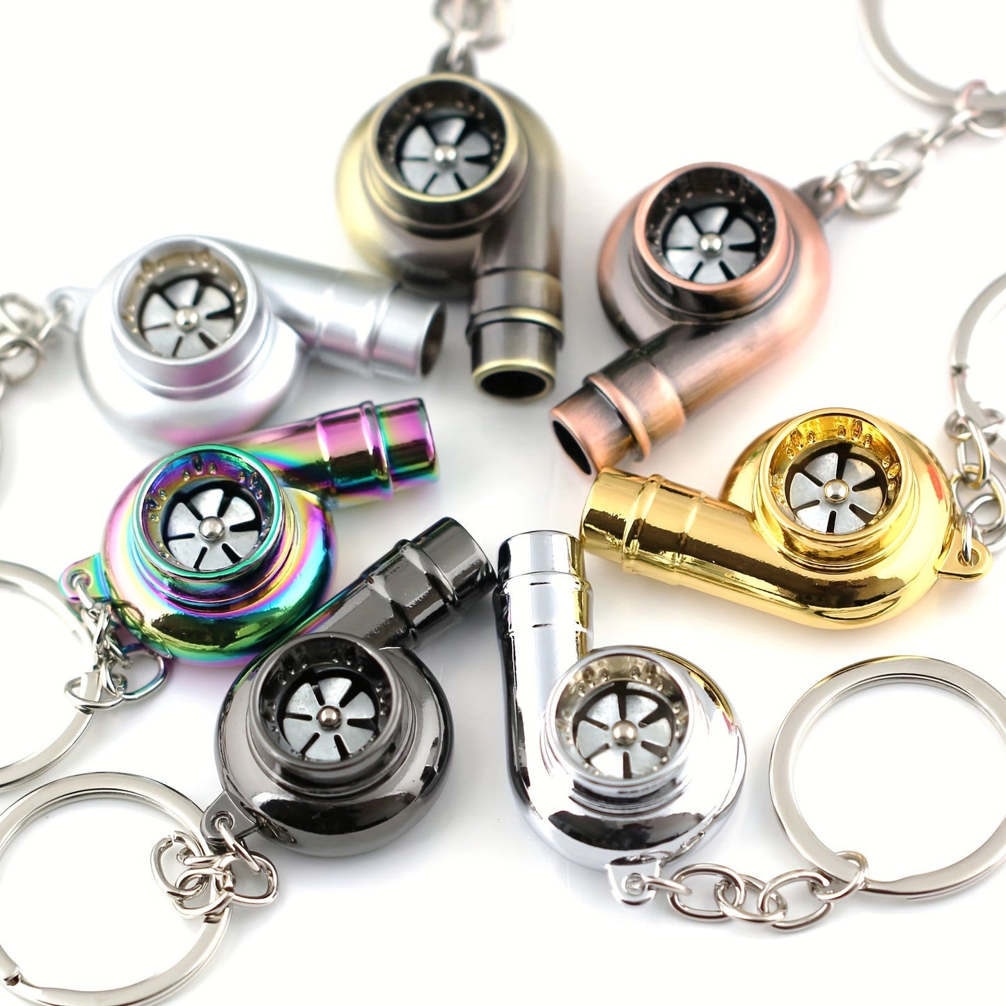 Keychain featuring a rotating turbine design, perfect for car enthusiasts. This creative accessory also doubles as a key holder and includes a turbine whistle feature. Ideal as a unique gift option.