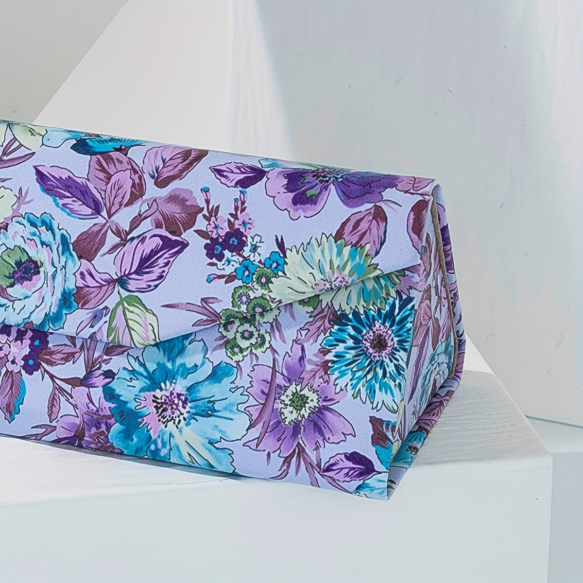 Set of 2 Eyeglass Cases: Floral design with 1 foldable case and 1 metal hard case for glasses storage.