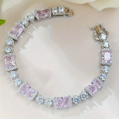 This stunning Sterling Silver Bracelet features dazzling Pink Cubic Zirconia stones. Ideal for everyday wear or as a thoughtful gift, especially for those born in October.