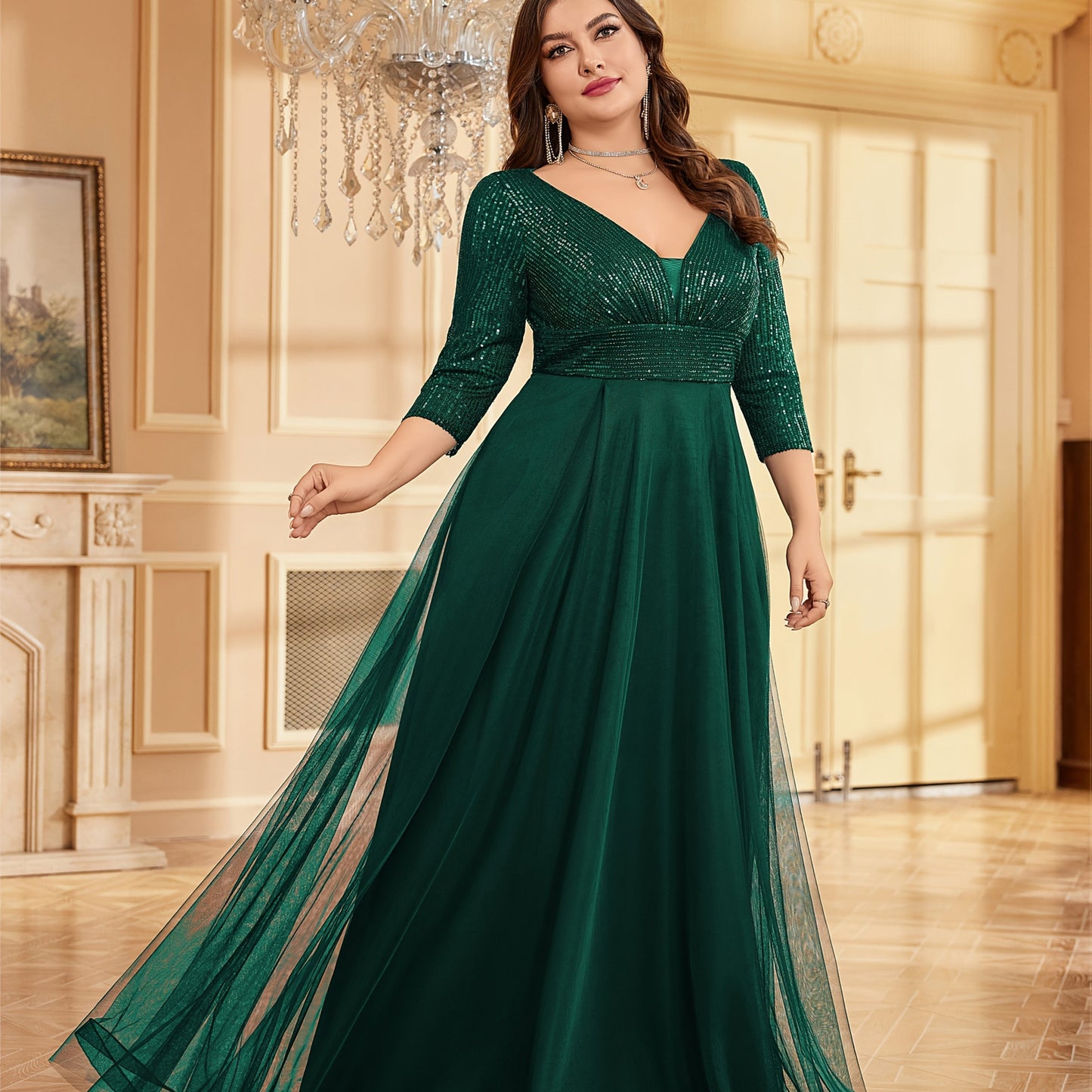 Emerald green sequin maxi dress with V-neck, mesh overlay, cinched waist, and three-quarter sleeves - perfect for formal events.