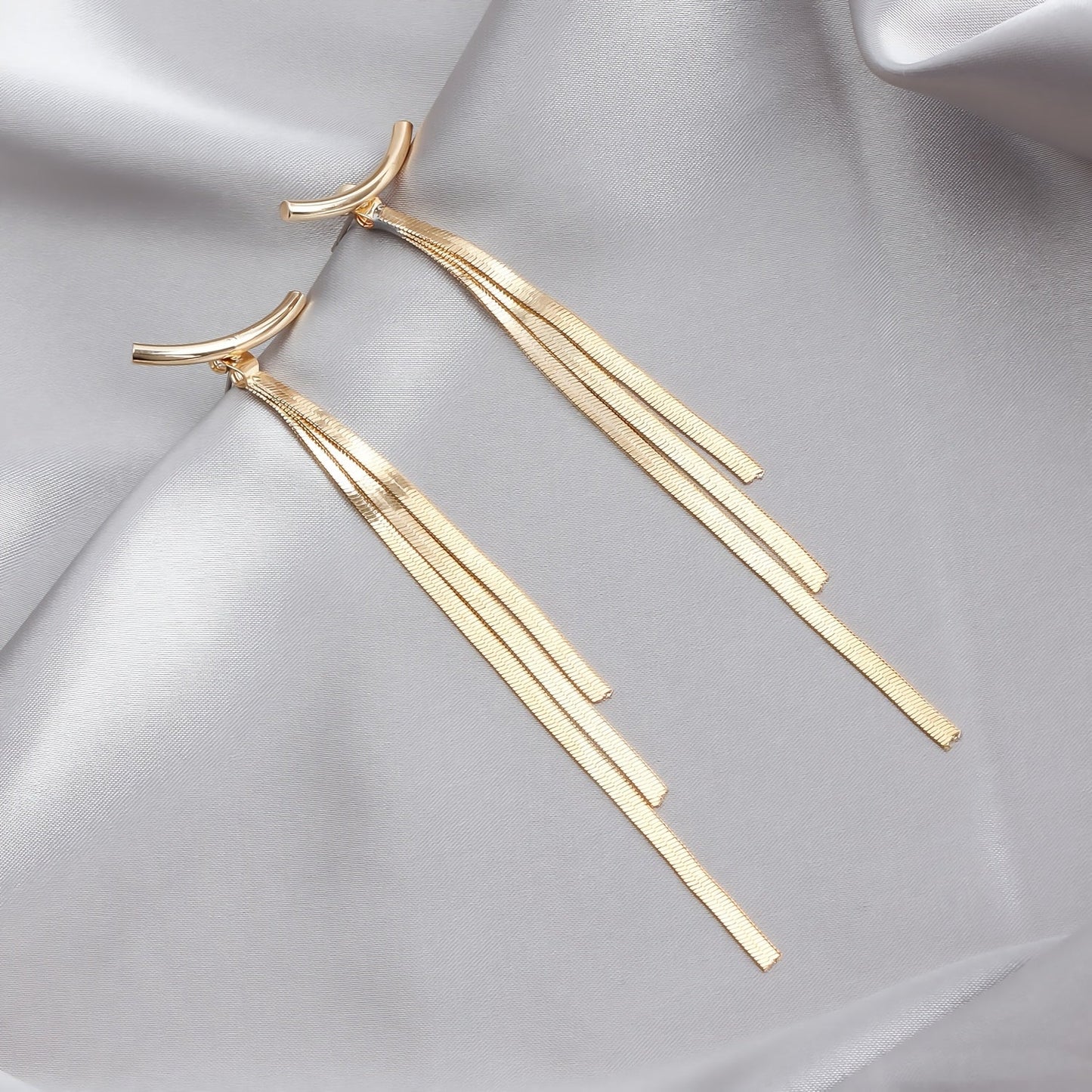 Elegant Vintage-Inspired Long Snake Bone Tassel Earrings - Set of 2, Crafted from UV Plated Alloy and Stainless Steel Posts, Perfect for Daily Wear and Parties, featuring Slimming and Cold Style, with Ear Studs for added elegance.