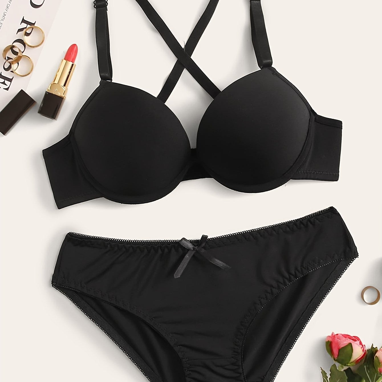 Push-up lingerie set for women, with underwire bra and high-waist panties. Nylon blend, available in black, white, and red.