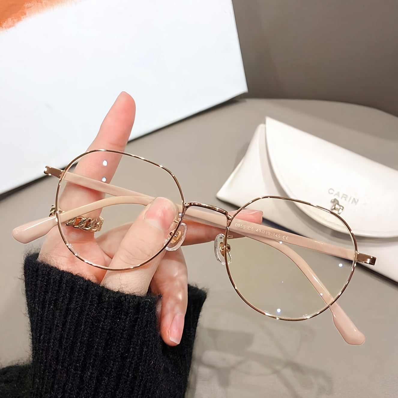 Golden and beige metal round glasses with full-rim design, ideal for reducing blue light exposure while using electronic devices.