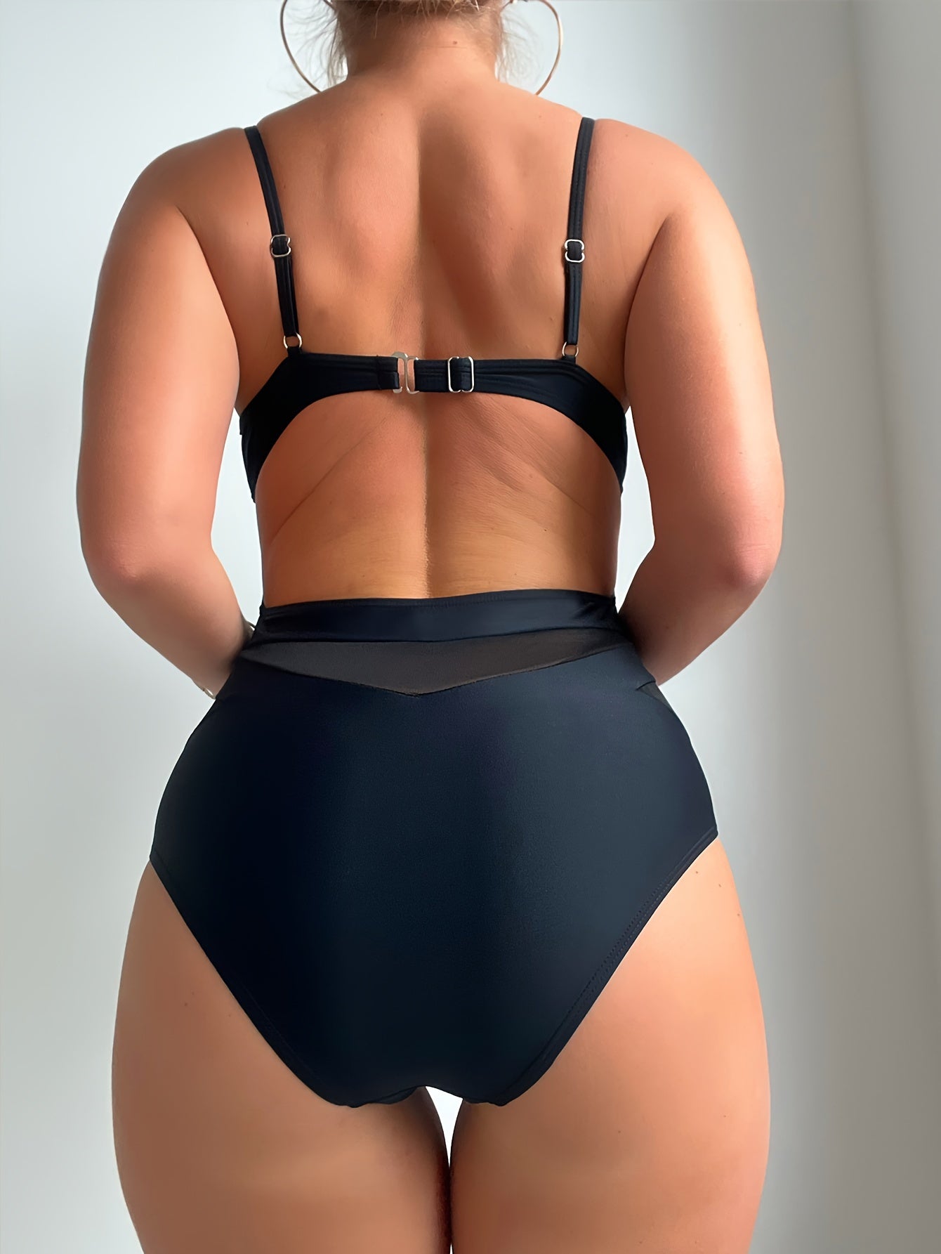 Seductive one-piece swimsuits with mesh high waist, plunging V-neck, and cut-out details.