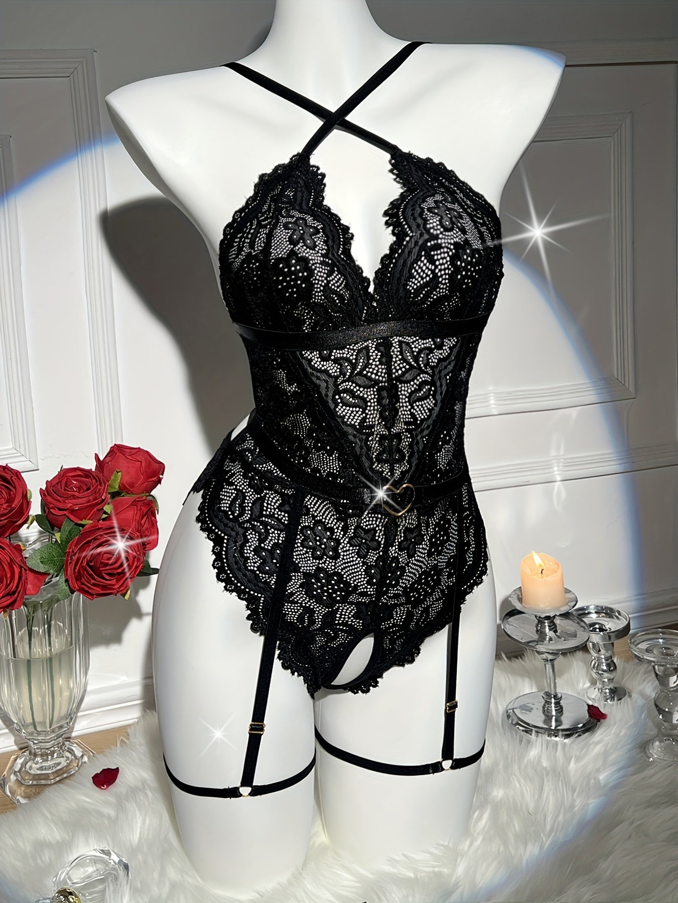 Floral lace lingerie set with open crotch, heart back teddy, garter belt, and sling design for women.