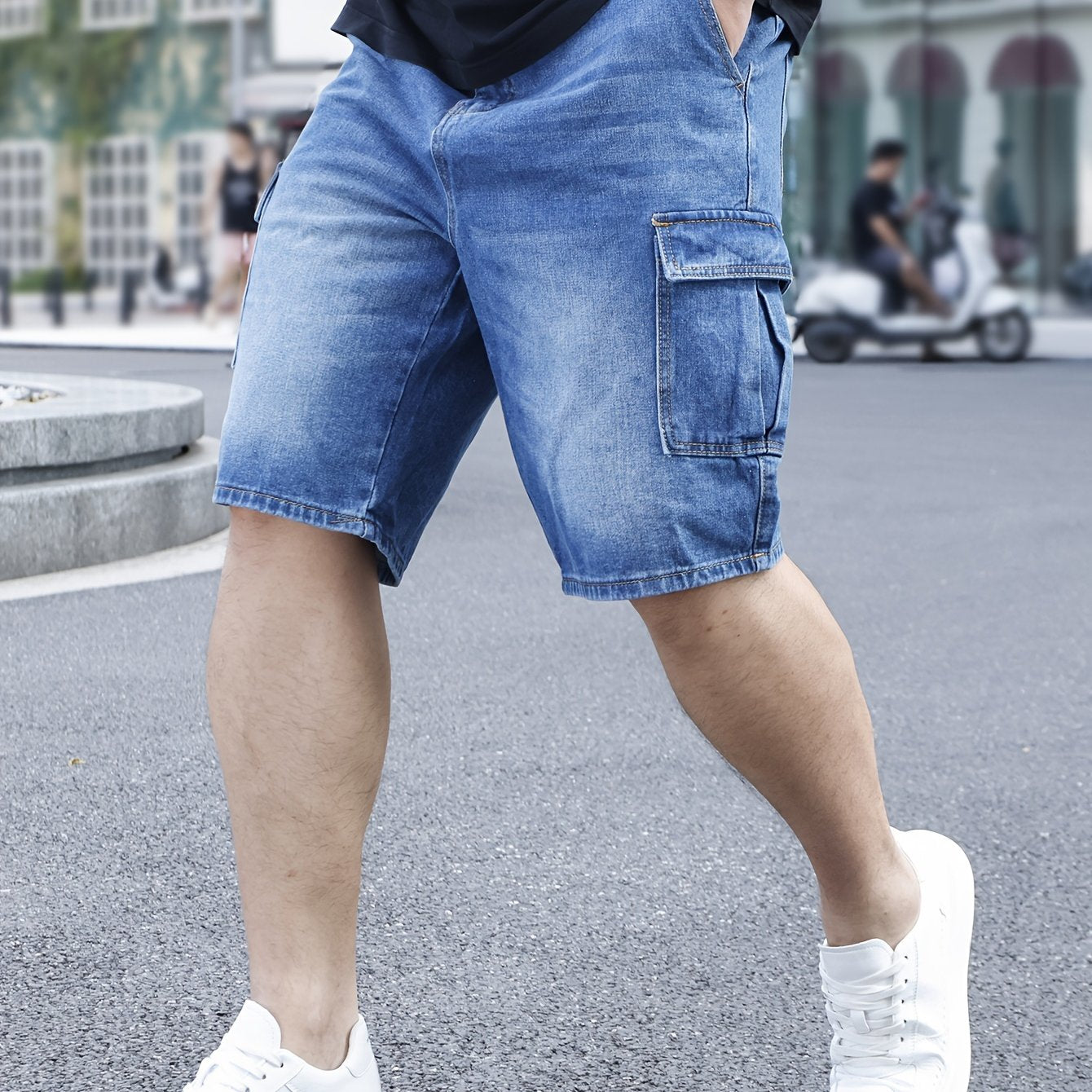 Men's plus size light blue denim shorts with casual fit, pockets, and classic style for casual attire.