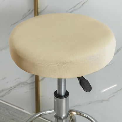 Stretchy round slipcover for bar stool, protecting furniture in dining, living, or office areas.