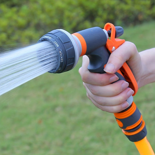 High-pressure garden spray gun with adjustable nozzle, lightweight plastic design, orange & black handles for easy grip.