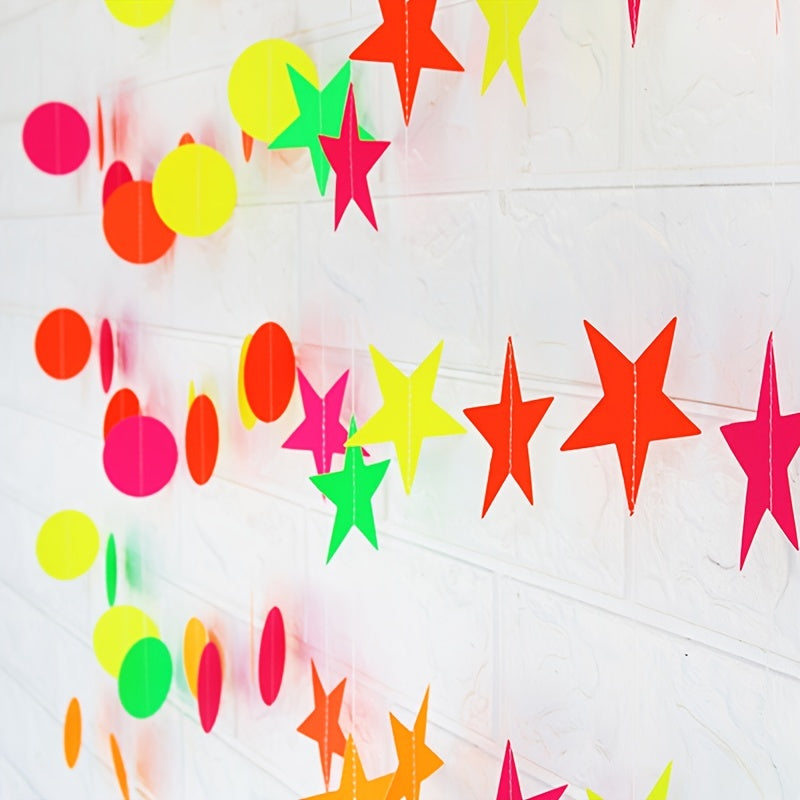 Fluorescent paper decoration with star discs, triangles, and pull flowers.