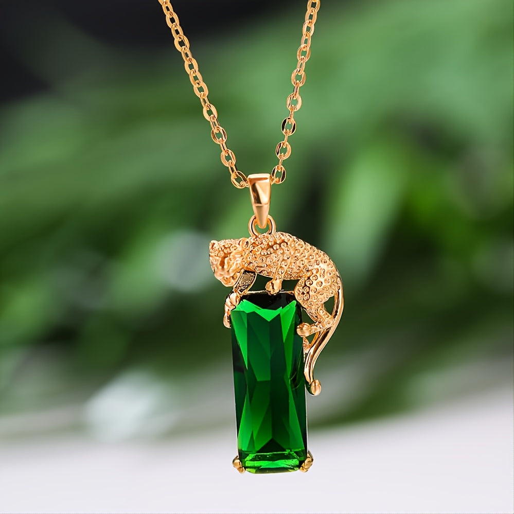 Golden plated green artificial crystal leopard pendant necklace, perfect for women who love hip hop punk style. This created emerald panther necklace makes a unique and stylish jewelry gift.