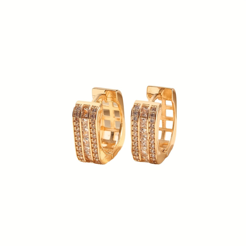 A stylish pair of MKOPSZ hoop earrings, featuring classic design and crafted with copper and synthetic zirconia. These earrings, representing the April birthstone, are perfect for both daily wear and special occasions. Inspired by a campus holiday theme