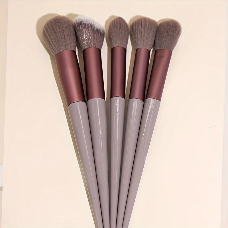 13 piece soft bristle makeup brush set in cream brown with pink & gray handles. Includes powder, blush, eyeshadow, and highlight brushes. Quick-dry, portable, and suitable for all skin