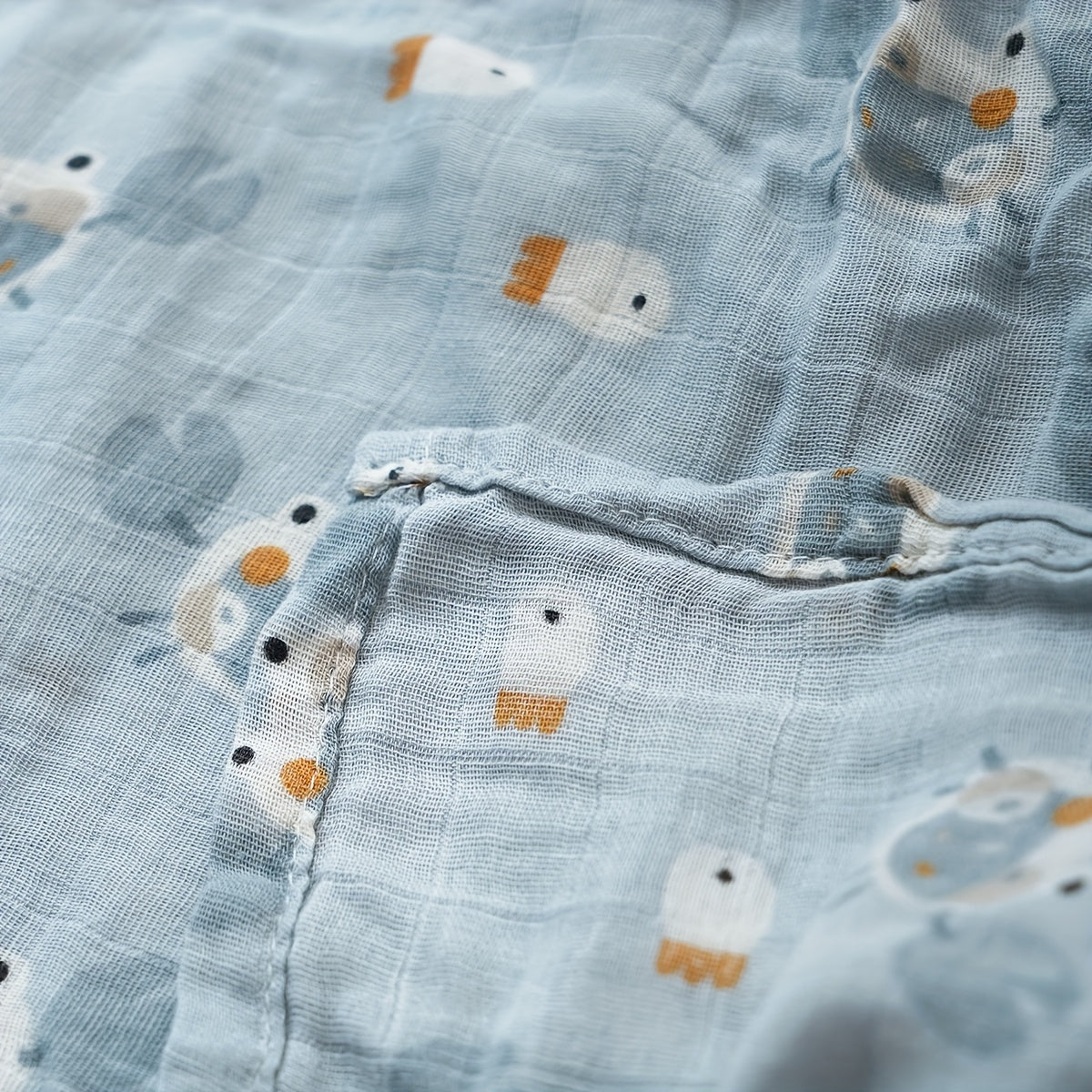 Soft and gentle muslin baby swaddle blanket made from cotton gauze, perfect for newborns. This super soft blanket also doubles as a quick dry kids bath towel and baby blanket cover.