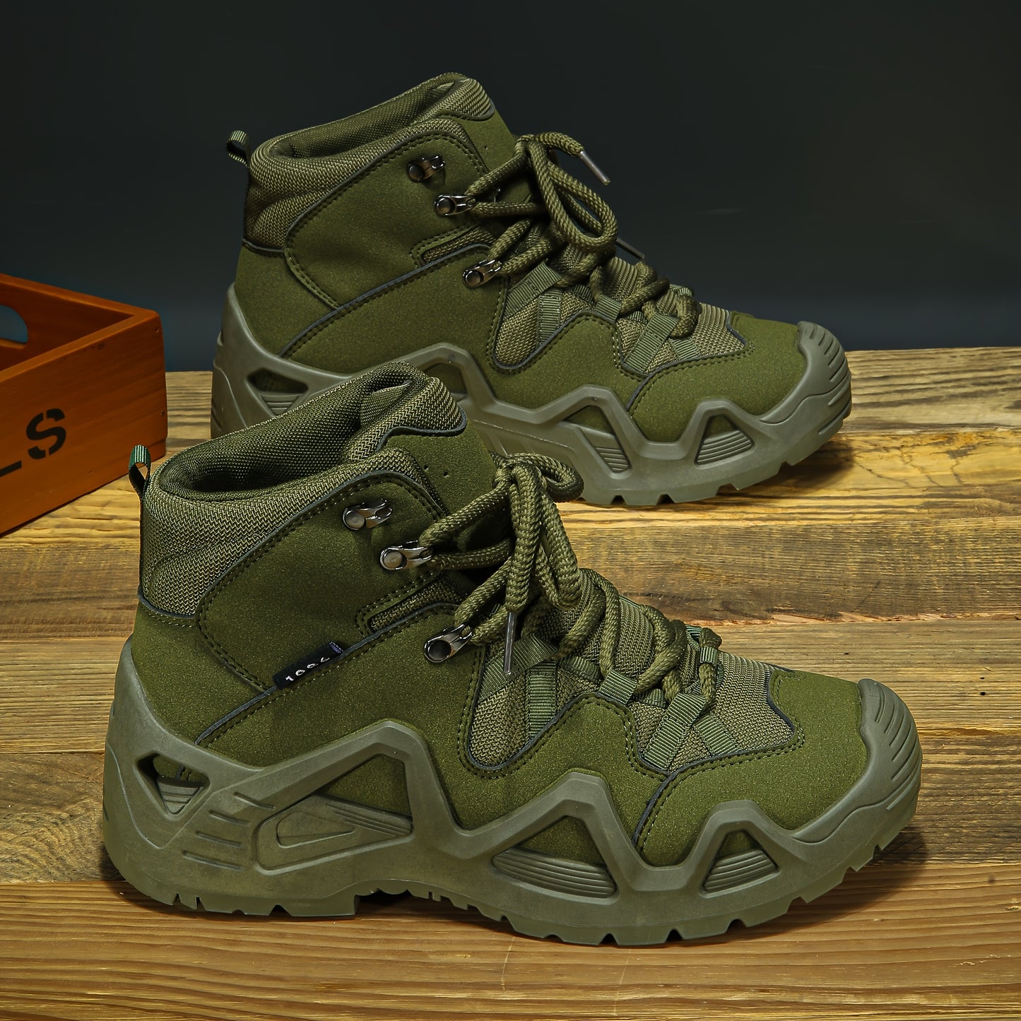 Men's durable, breathable, vintage-inspired hiking boots with a rugged sole in green high-top design for all-season outdoor adventures.