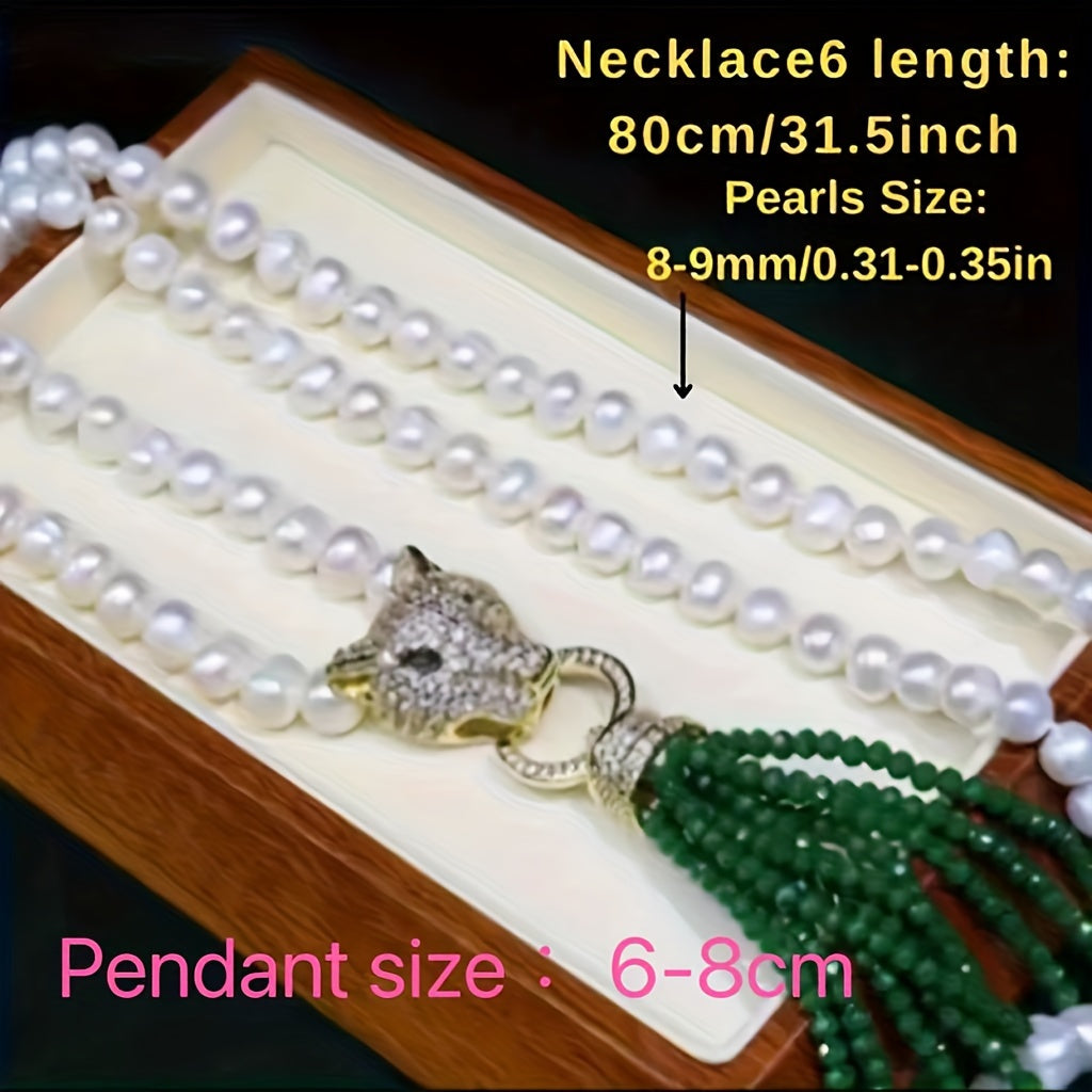 A classic Y-necklace featuring freshwater pearls and a stylish leopard clasp - perfect for adding a touch of elegance to any outfit. This versatile piece is great for weddings, banquets, music festivals, vacations, and the autumn season. It also makes a