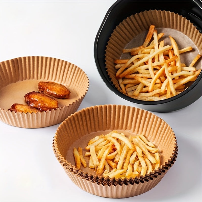 70 pieces of non-stick air fryer liners measuring 16.0cm, perfect for baking, cooking, and microwave use. These disposable paper bowls are oil and grease resistant, making them essential kitchen accessories.