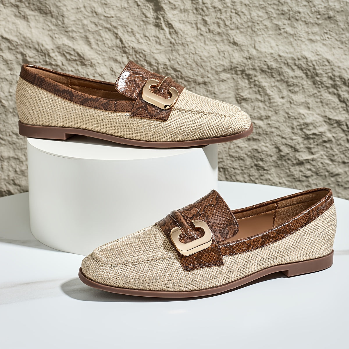 Women's brown snakeskin slip-on loafers with golden "C" buckle, lightweight sole, casual shoes.