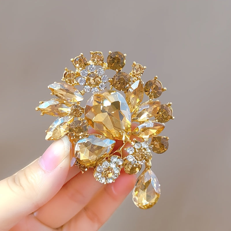 Vintage crystal brooch pin with irregular teardrop pendant and novelty glass flower design - an elegant and high-end fashion accessory for women.