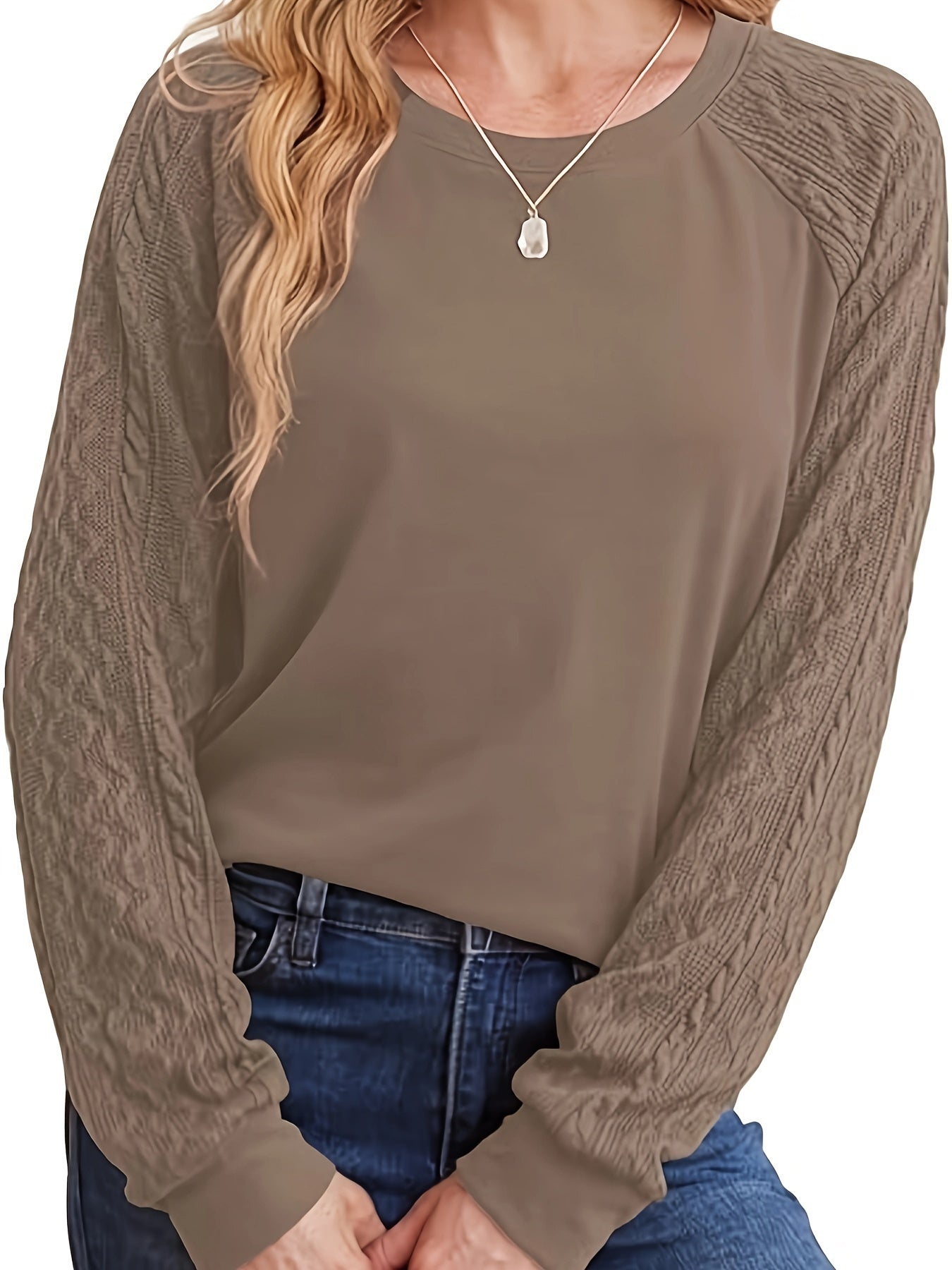 Womens' casual brown cable knit sweater with long sleeves, round neck, stretchy polyester blend. Machine washable and cozy.