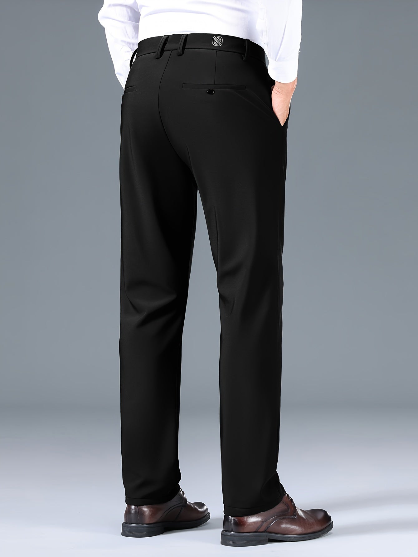 Slim fit stretchy men's pants suitable for both business and casual wear.