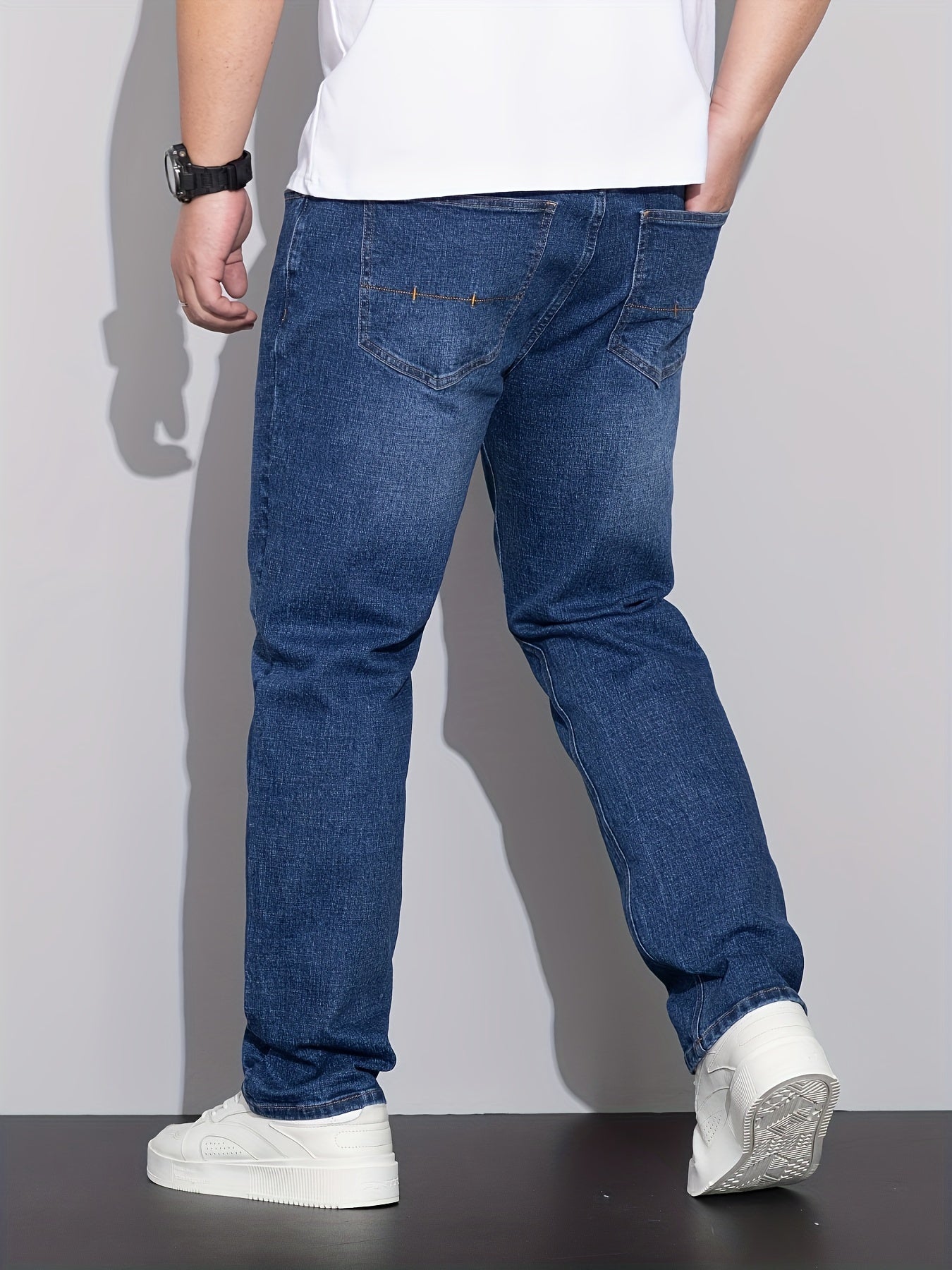 Comfortable stretch denim jeans for plus size men with versatile business style, straight-leg, and machine washable