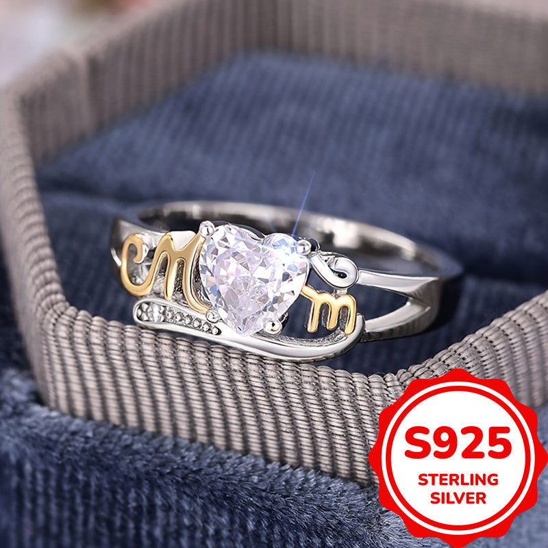 Heart-shaped zirconia ring in sterling silver with MOM lettering, featuring a 4-prong setting in a vintage sexy style. Perfect for all seasons, this ring makes a great Mother's Day gift. It also includes a synthetic gemstone representing April's