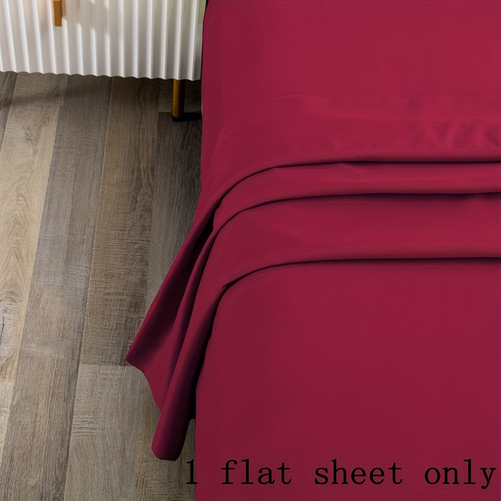 Soft and luxurious 100% microfiber flat sheet in a solid color with a brushed finish - Easy to care for with machine washable material, perfect for any bedroom or guest room.