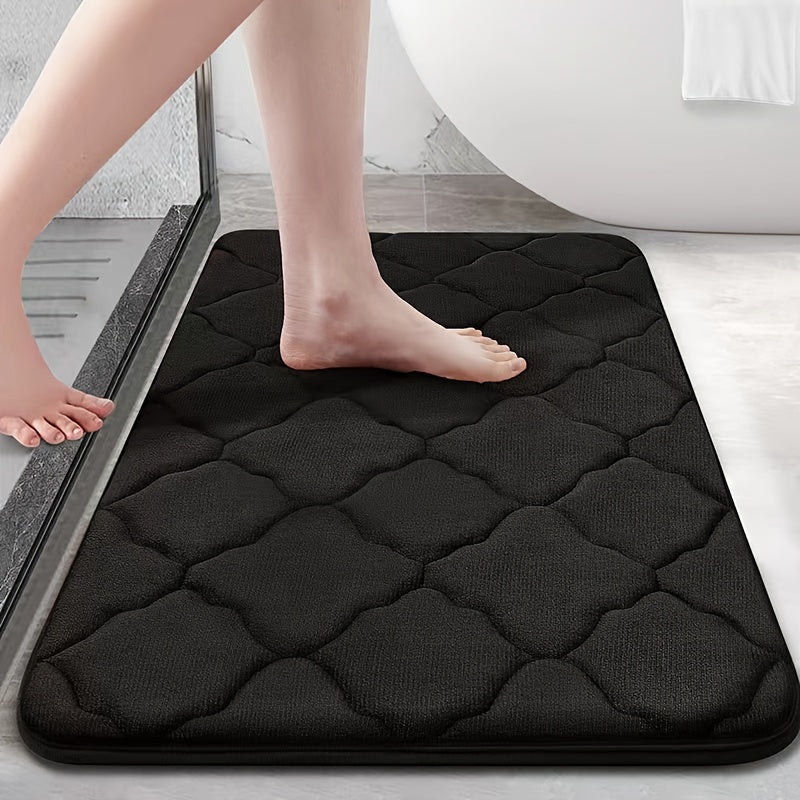 Soft plush bathroom mat with non-slip, absorbent, and machine washable features. Made of cozy coral fleece with a cute short pile design for a comfortable toilet experience.