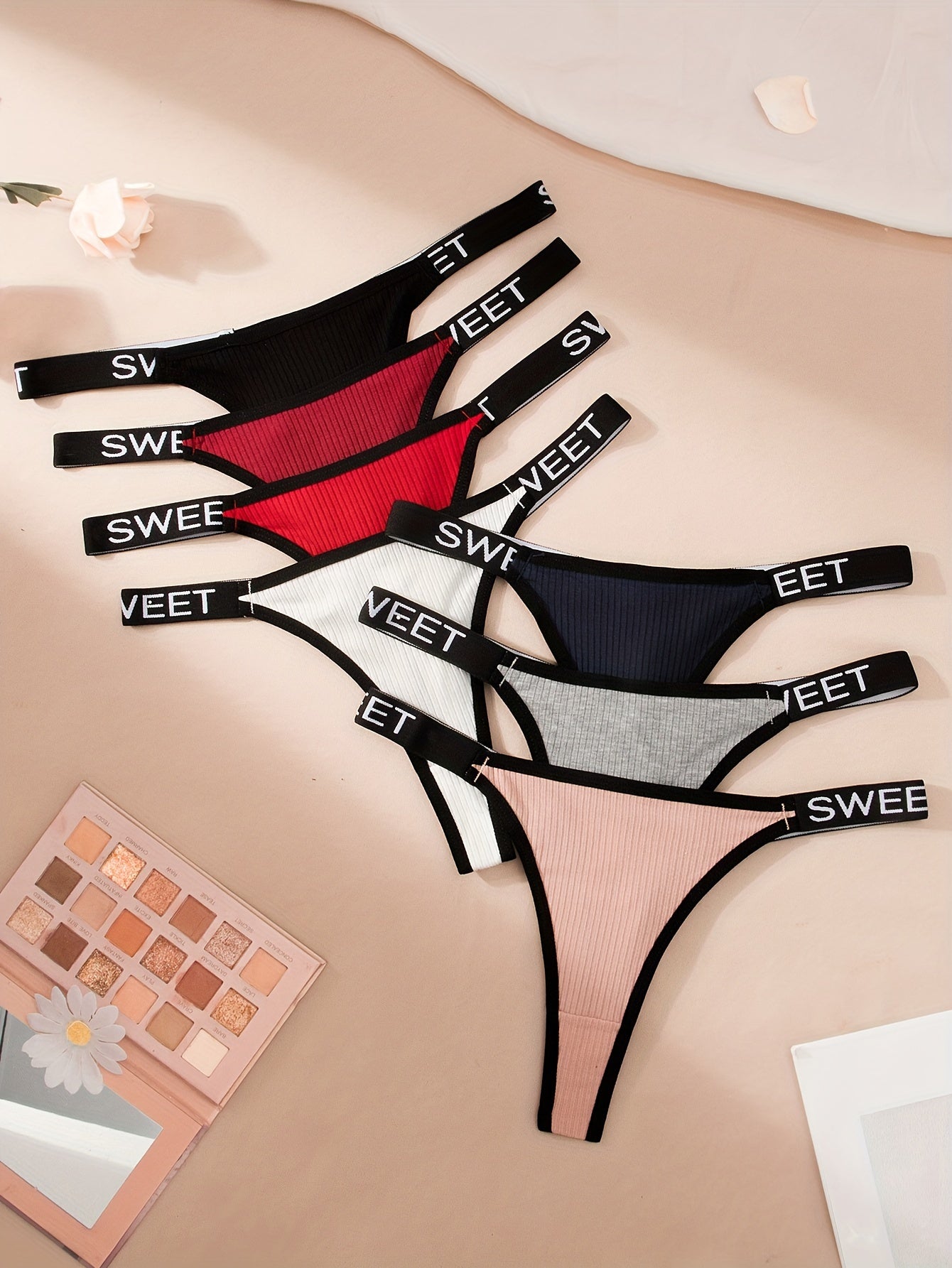 7pcs Letter Tape Contrast Binding Thongs: Sexy, comfortable, and stretchy intimates for women.