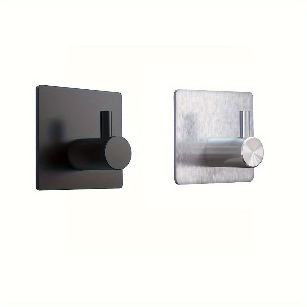 Contemporary self-adhesive stainless steel hook for towels, robes, coats, and other items in the bathroom or kitchen, with a waterproof design for easy shower wall mounting.