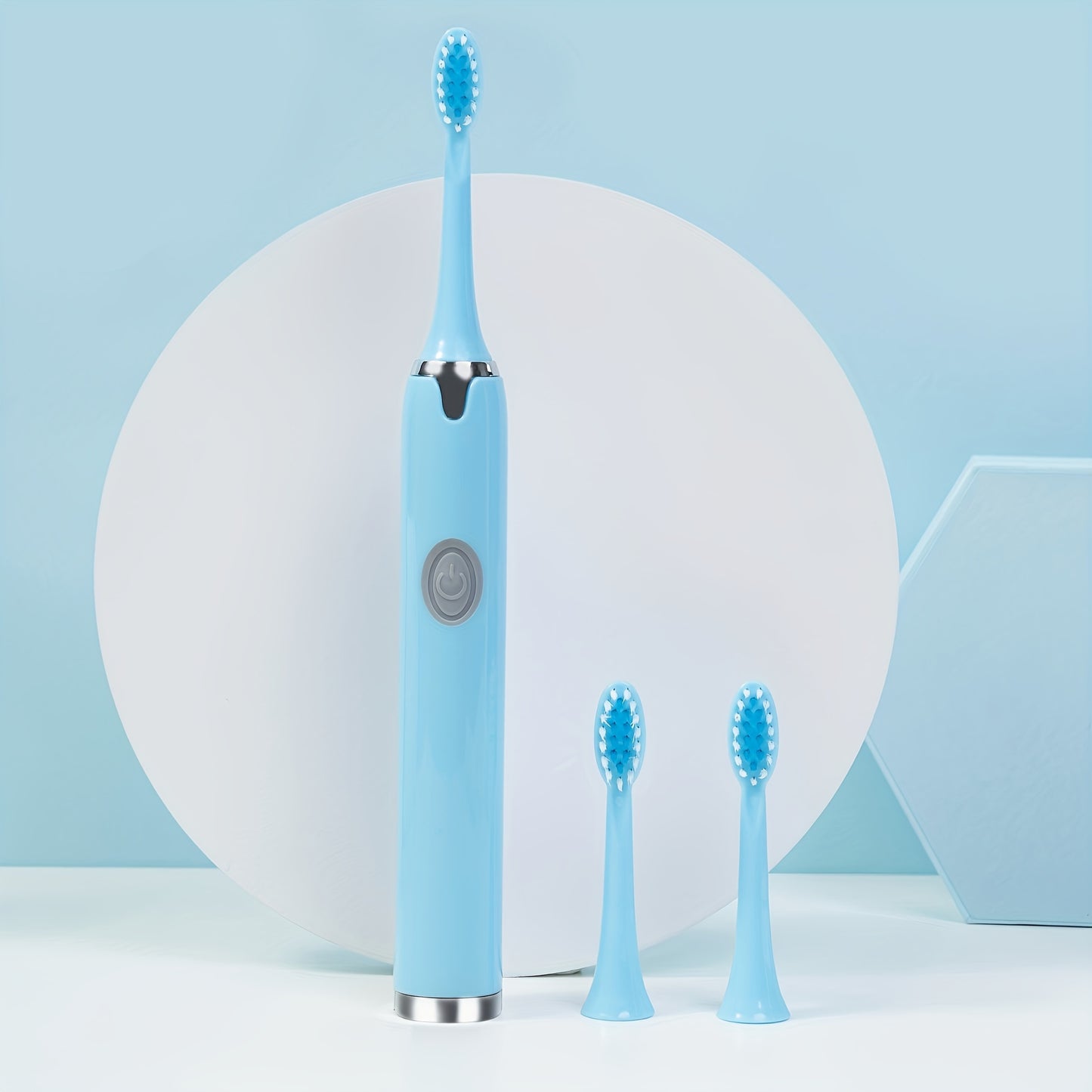 Set includes a battery-powered travel toothbrush, portable toothbrush, and 3 brush heads. Batteries not included.