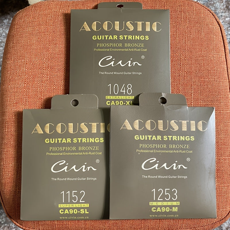 Acoustic folk guitar strings with carbon steel and phosphor copper coating, rust-resistant, high-quality packaging, 6 strings, bright sound, smooth feel, ideal for stage performance.